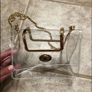 Clear purse with gold chains